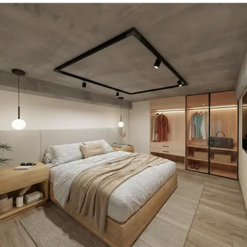 Zona de descanso de un apartaestudio de 134 LOFT con clóset y televisor